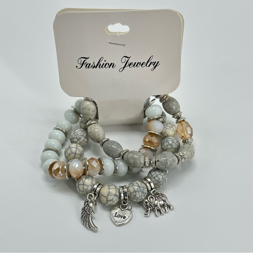 NWT 3 Piece Boho Stretch Bracelet Set Angel Wing Heart Elephant Charm Gray
